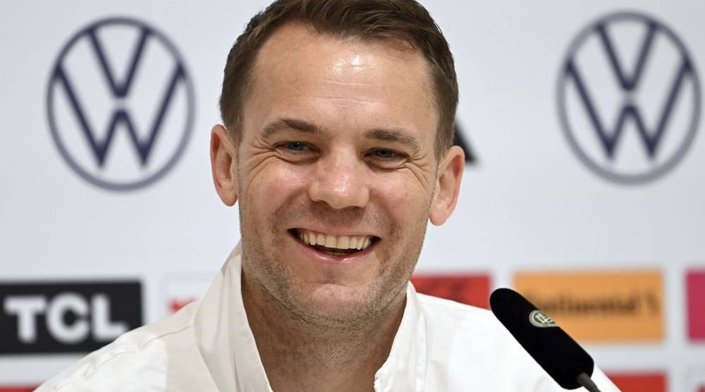 Germany's goalkeeper Manuel Neuer smiles during press conference of the German national soccer team in Herzogenaurach, Germany, Monday, June 17, 2024. (dpa via AP) 
