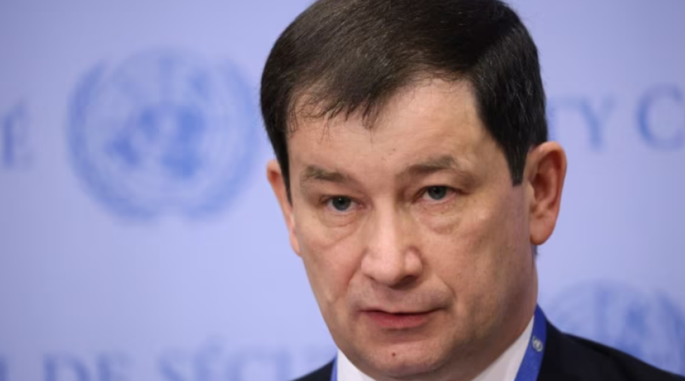 Russia's Deputy Ambassador to the UN Dmitry Polyanskiy addresses a news conference ahead of a meeting of the United Nations Security Council on Russia's invasion of Ukraine, at the United Nations headquarters in New York City, New York, US, April 19, 2022. REUTERS/Andrew Kelly/File Photo Purchase Licensing Rights