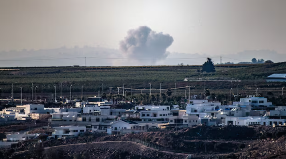 Smoke billows over southern Lebanon following Israeli strikes, amid ongoing cross-border hostilities between Hezbollah and Israeli forces, as seen from the Israeli side of Israel Lebanon border September 23, 2024 / REUTERS