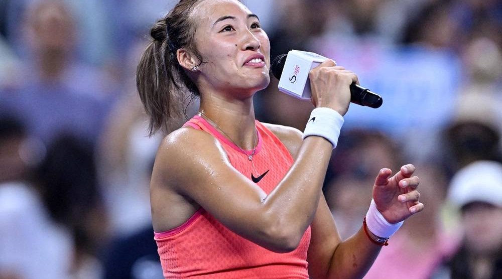 China’s Zheng Qinwen speaks to fans after winning against Russia’s Kamilla Rakhimova at their women’s singles match during the China Open tennis tournament in Beijing on September 28, 2024. (AFP) 