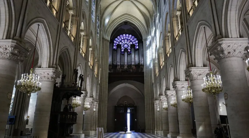 The immense organ has been likened to the 'soul' of Notre Dame. STEPHANE DE SAKUTIN / POOL/AFP
