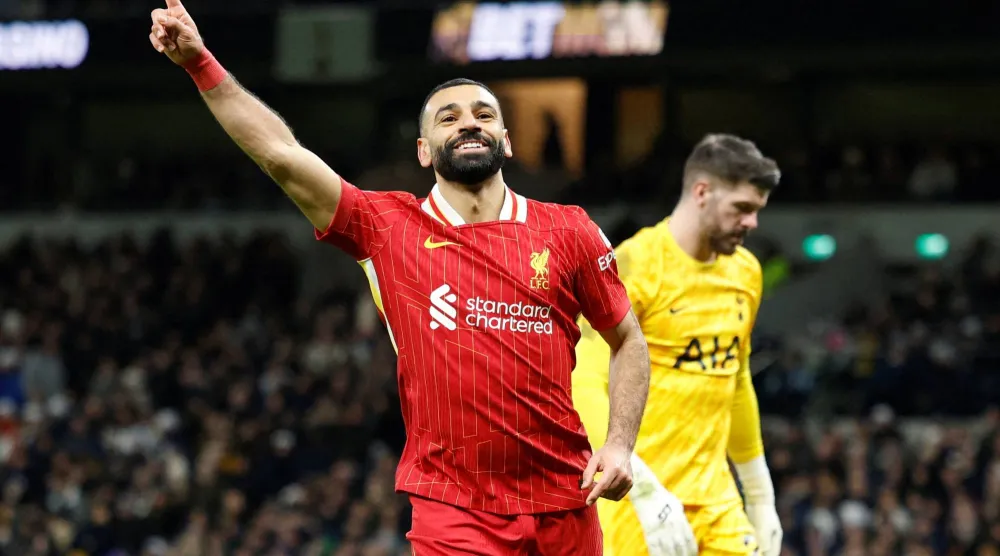 Soccer Football - Premier League - Tottenham Hotspur v Liverpool - Tottenham Hotspur Stadium, London, Britain - December 22, 2024 Liverpool's Mohamed Salah celebrates scoring their fifth goal Action Images via Reuters/John Sibley