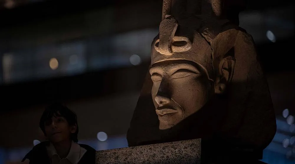A visitor tours the Grand Egyptian Museum, in Giza on the southwestern outskirts of the capital Cairo on February 7, 2025, set to open fully on July 3, following a partial opening in October. (AFP)