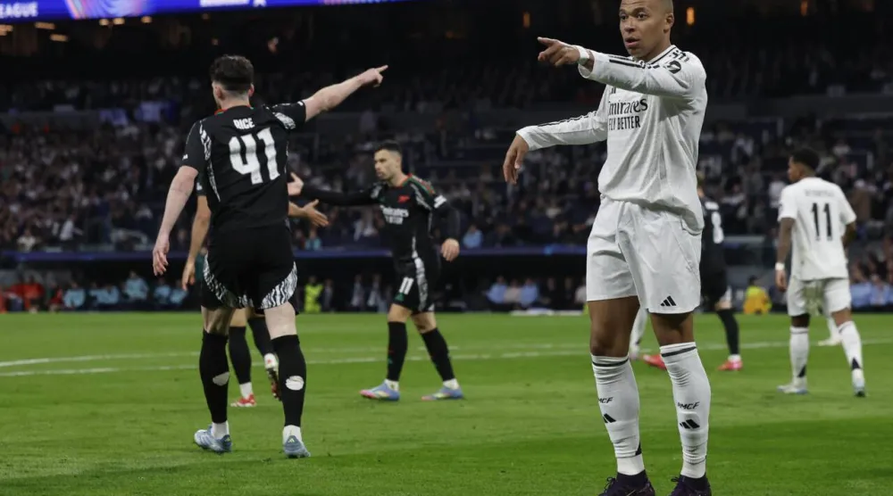 Real Madrid's French forward Kylian Mbappe could not help his team overcome Arsenal. OSCAR DEL POZO / AFP
