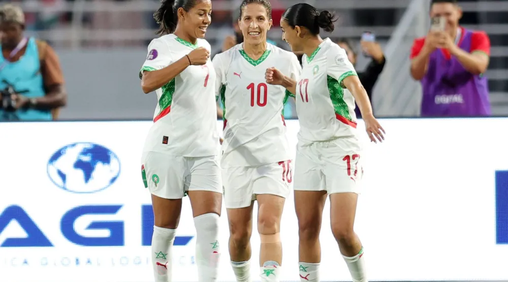 لاعبات المغرب يحتفلن بالفوز (الاتحاد الأفريقي)