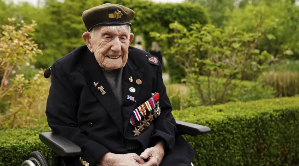 WW2 veteran Donald Rose, 110, poses for a photo at the National Memorial Arboretum, ahead of a memorial event hosted by the Royal British Legion to mark the 80th anniversary of V-E Day, in Alrewas, Staffordshire, England, Thursday, May 8, 2025. (Jacob King/PA via AP, File)

