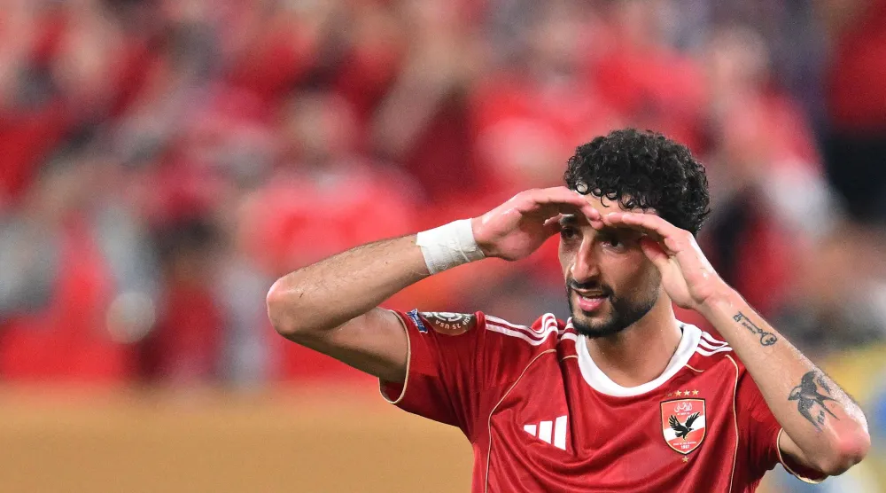 الفلسطيني وسام أبوعلي مهاجم النادي الأهلي (أ.ف.ب)