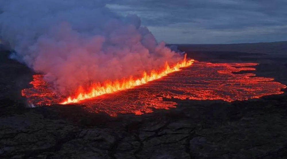 Lava emerges through a fissure following a volcano eruption near Grindavik, Reykjanes, Iceland July 16, 2025. Hordur Kristleifsson via Civil Protection Of Iceland/Handout via REUTERS