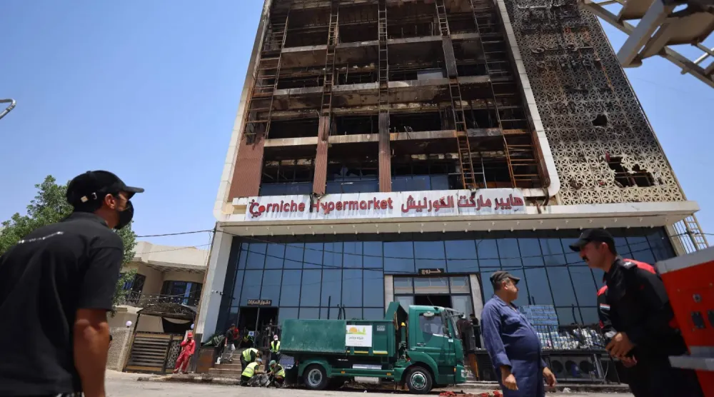 Yanmış binanın dışından bir fotoğraf... 17 Temmuz 2025 (AFP)