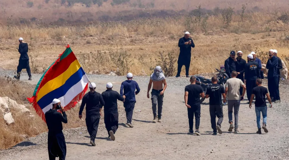 Suriye ve İsrail'den Dürziler işgal altındaki Suriye'nin Golan Tepeleri'ndeki tampon bölgede buluştu (AFP)