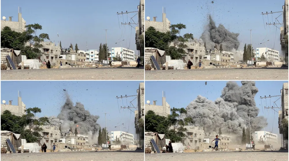 لقطات من مقطع فيديو تظهر فتاة تركض من مكان الحادث أثناء غارة إسرائيلية على مدرسة تؤوي نازحين في مخيم البريج الأربعاء (رويترز)