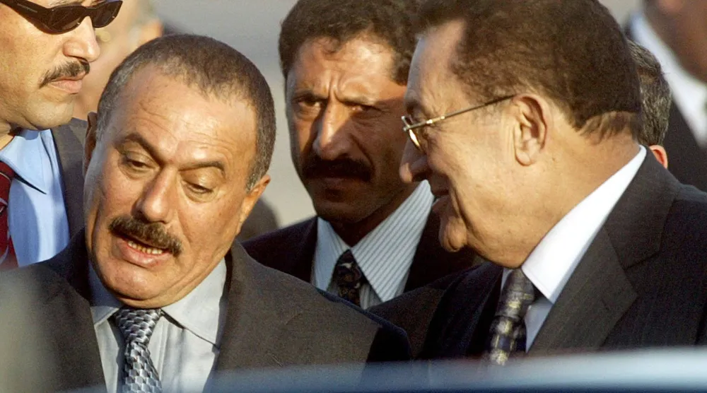 Saleh with Hosni Mubarak in 2003 (AFP) 