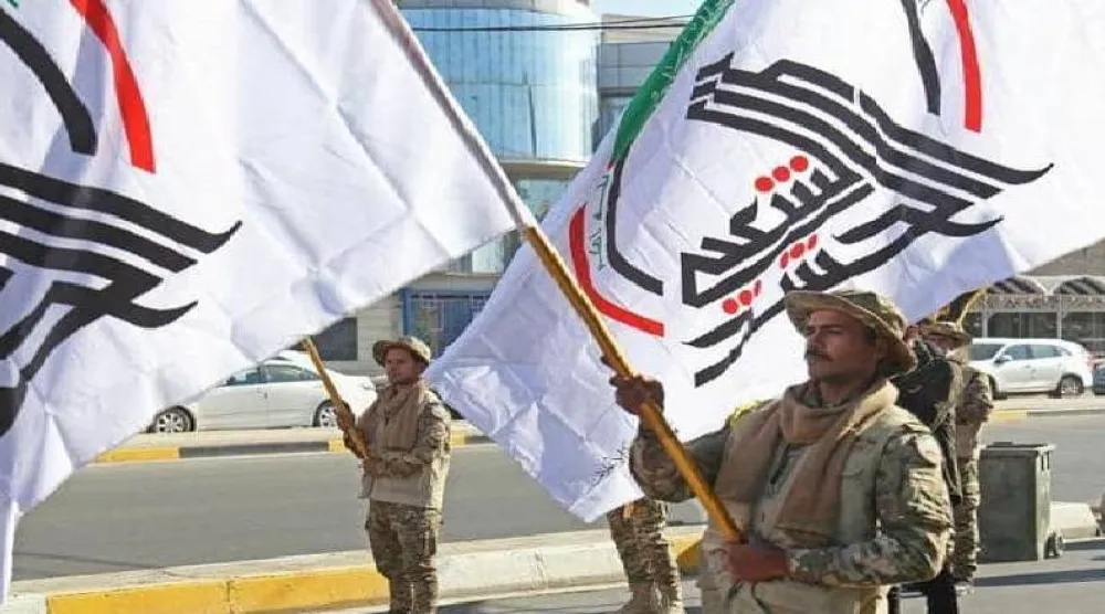 عناصر من الحشد يشاركون في تأمين زيارة الأربعين إلى كربلاء (إعلام الحشد)