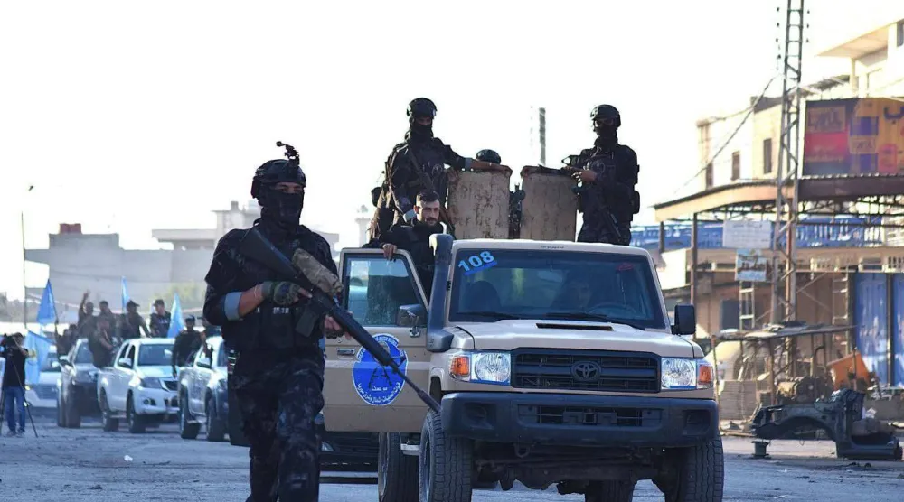 عرض عسكري لـ«قسد» في وقت سابق بمدينة الحسكة شمال شرقي سوريا (أرشيفية - الشرق الأوسط)