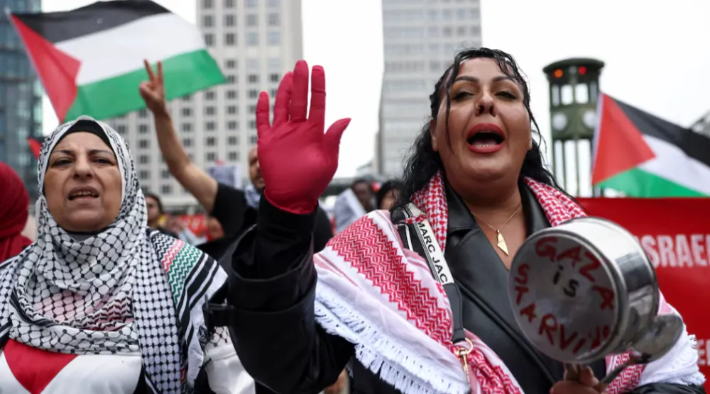 People protest against Israel and in solidarity with Palestinian children in Gaza, at Potsdamer Platz, in Berlin, Germany, August 3, 2025. REUTERS/Nadja Wohlleben/File Photo 