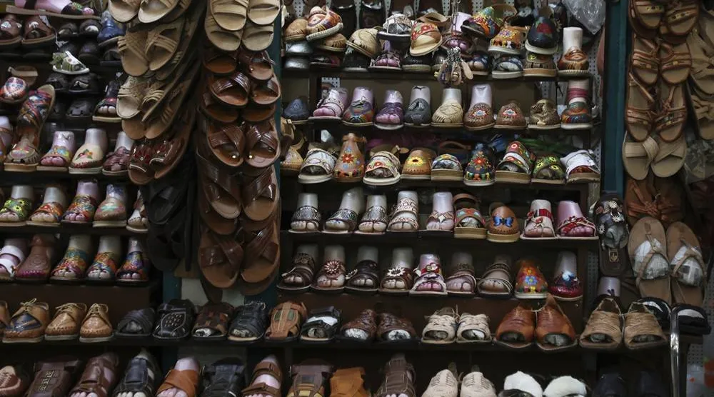 Sandals known as "huaraches" are displayed for sale at a market in Oaxaca, Mexico, Friday, Aug. 8, 2025. (AP) 