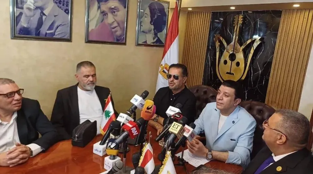 مصطفى كامل بجوار راغب علامة (نقابة الموسيقيين المصرية)