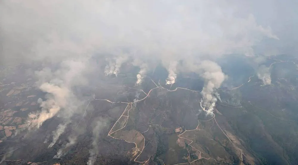  This recent photo taken from a French Canadair water bomber and provided Friday, Aug. 15, 2025 by the Securite Civile shows wildfire in Spain. (Securite Civile via AP) 