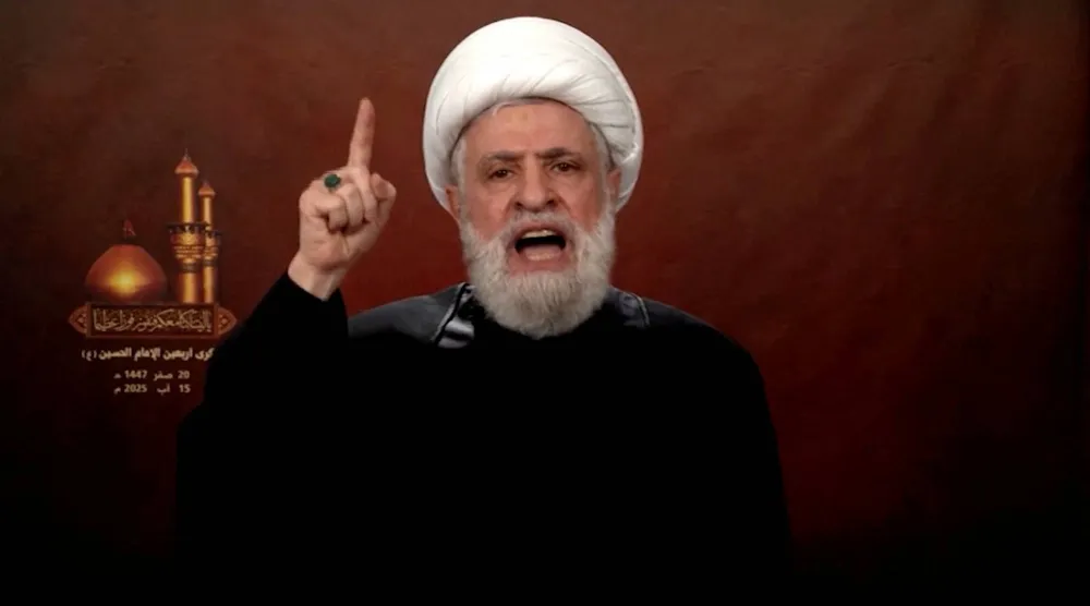 أمين عام "حزب الله" نعيم قاسم خلال خطاب متلفز ألقاه الجمعة من مدينة بعلبك بشرق لبنان (رويترز)