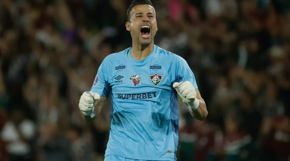 Fabio of Fluminense celebrates a goal by Kevin Serna (not pictured) during a CONMEBOL Sudamericana round of 16 match between Fluminense and America de Cali in Rio de Janeiro, Brazil, 19 August 2025. EPA/Antonio Lacerda
