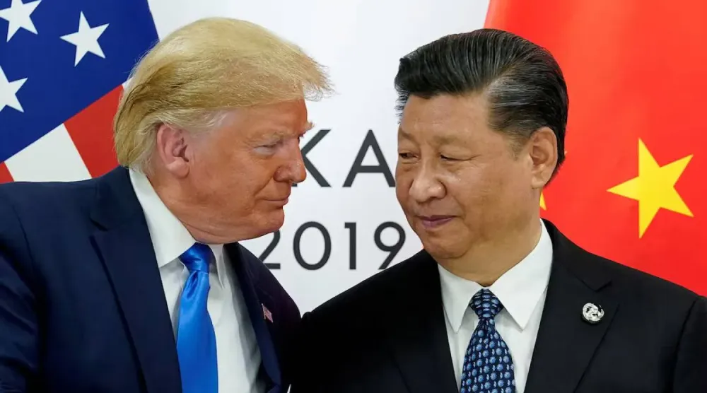 ABD Başkanı Donald Trump ile Çinli mevkidaşı Şi Cinping arasında daha önce yapılan bir görüşme (Arşiv- Reuters)