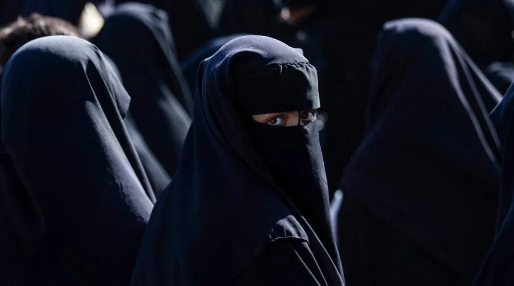 Bağdat, bu yılın başlarından bu yana Suriye'den 5 binden fazla vatandaşını geri aldığı 13 nakil operasyonu gerçekleştirdi (AFP)