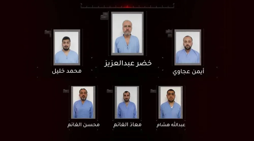المتهمون الخمسة من بين متهمين آخرين في خلية الفوضى التابعة للأخوان المسلمين (وكالة الأنباء الاردنية)