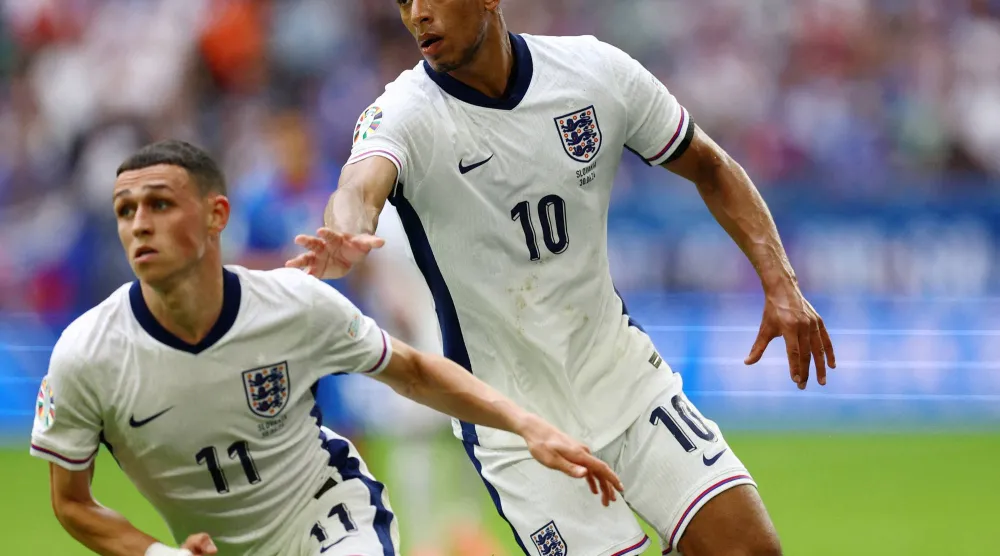 جود بلينغهام لاعب ريال مدريد وفيل فودن لاعب مان سيتي يعودان لتمثيل «الأسود الثلاثة» (رويترز)