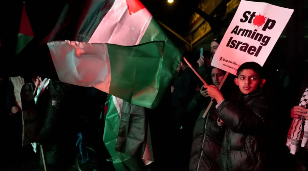 Pro Palestinian campaigners protest outside Villa Park, ahead of the Europa League soccer match between Aston Villa and Maccabi Tel Aviv in Birmingham, England, Thursday, Nov. 6, 2025. (Joe Giddens/PA via AP)
