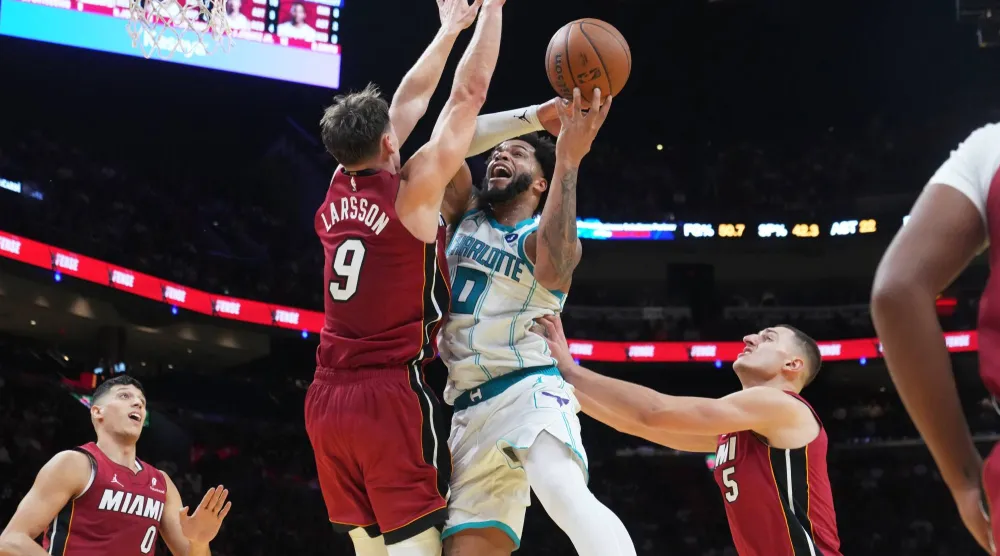 ميامي هيت هزم ضيفه تشارلوت هورنتس (أ.ب)