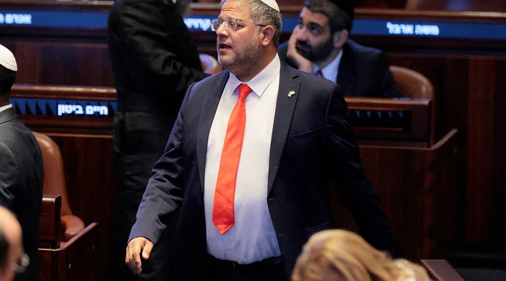 أرشيفية لوزير الأمن القومي المتطرف إيتمار بن جفير يتجول داخل الكنيست (رويترز)