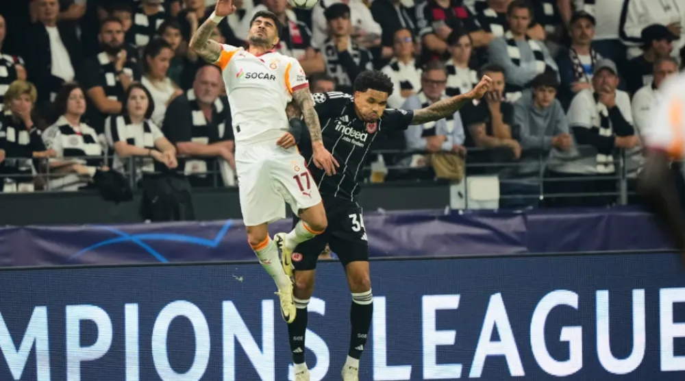 Galatasaray’s Eren Elmali, left, and Frankfurt’s Nnamdi Collins jump for a header during the Champions League opening phase soccer match between Eintracht Frankfurt and Galatasaray in Frankfurt, Germany, Thursday, Sept. 18, 2025. (AP Photo/Martin Meissner, File)

