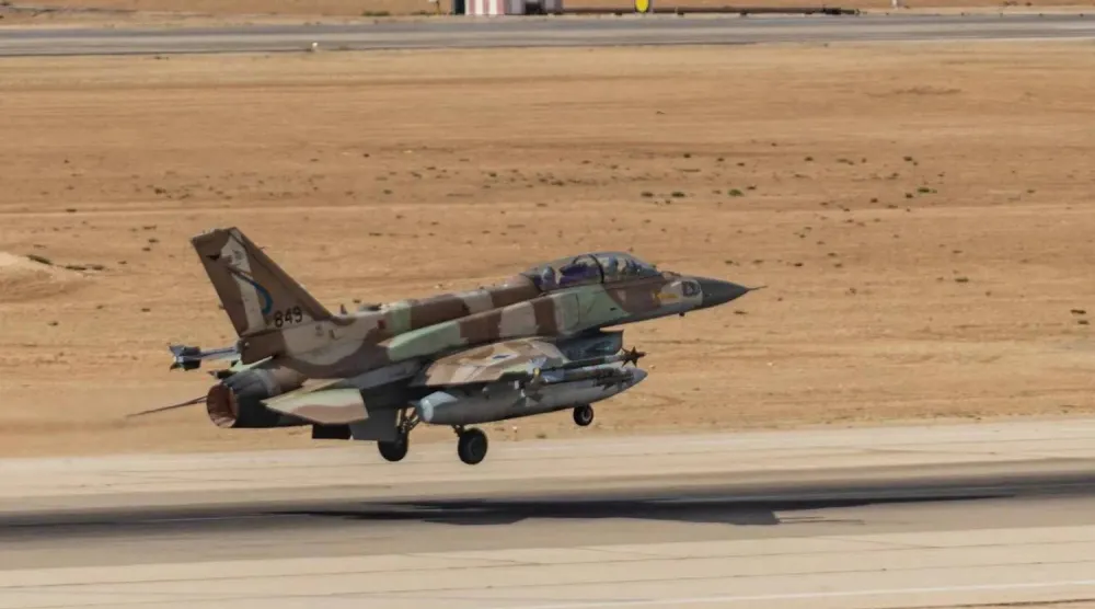 An Israeli F-16 carrying air-to-air missiles and extra fuel tanks takes off from an air base (Israel Defense Forces)