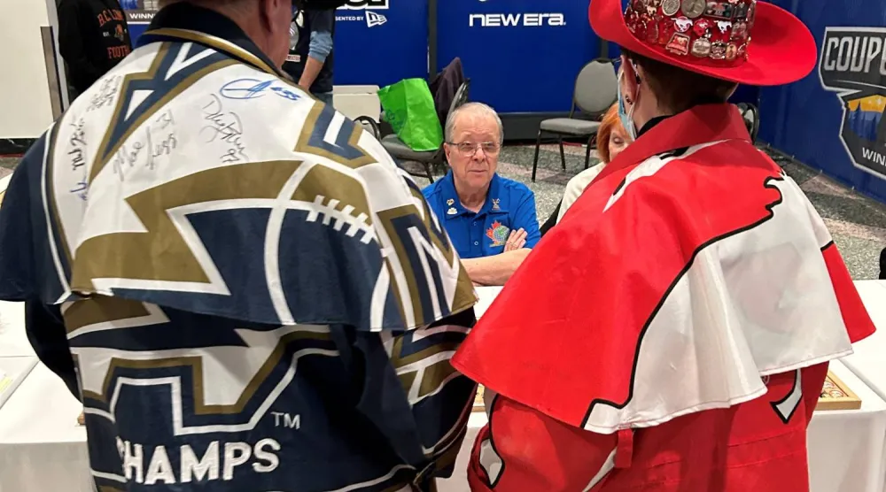 Canadian Football League supporters wear colorful outfits during the Grey Cup Championship week in Winnipeg, Manitoba, Canada, November 13, 2025. REUTERS/Ed White
