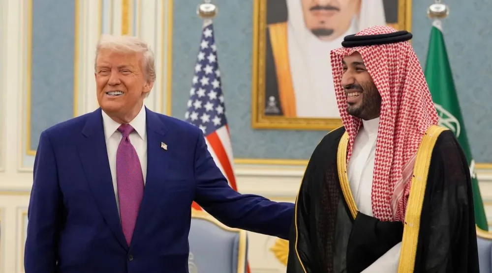 الأمير محمد بن سلمان والرئيس دونالد ترمب لدى زيارة الأخير إلى الرياض 13 مايو 2025 (أ.ب)