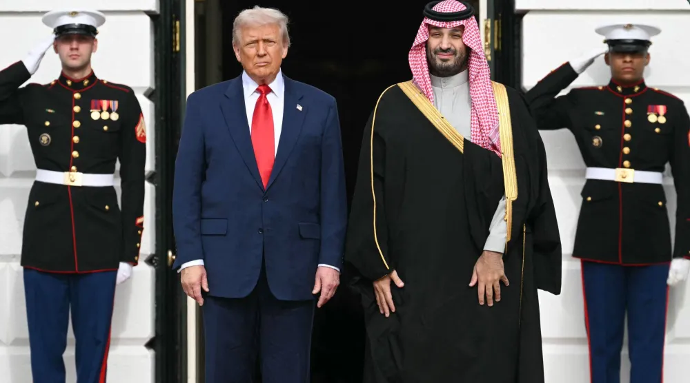 US President Donald Trump greets Prince Mohammed bin Salman, Saudi Crown Prince and Prime Minister, on the South Lawn at the White House in Washington, DC on November 18, 2025. (AFP) 