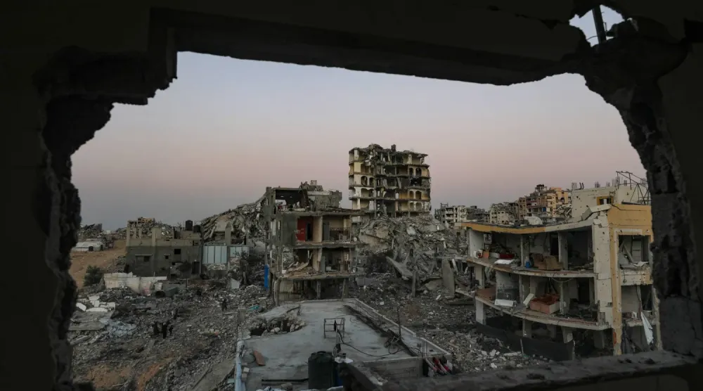 Gazze şehrindeki yıkılmış binaların görünümü, 18 Kasım 2025 (EPA)