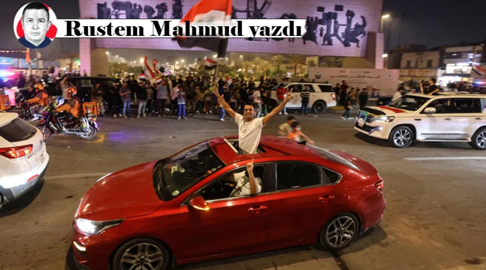 Irak Başbakanı Sudani’nin destekçileri, Bağdat'ta seçimlerin ön sonuçlarının açıklanmasının ardından sevinç gösterisinde bulunurken, 12 Kasım 2025 (AFP)