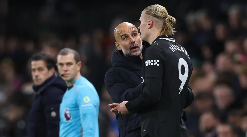 غوارديولا وهالاند خلال مواجهة فولهام (رويترز)