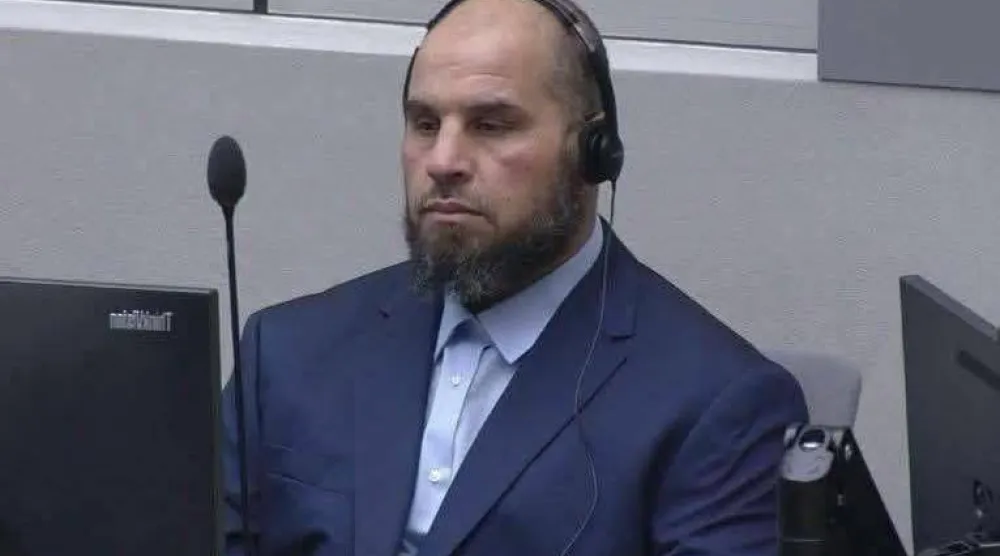 الهيشري القيادي في «جهاز الردع» الليبية خلال مثوله أمام المحكمة الجنائية الدولية الأربعاء (المحكمة)