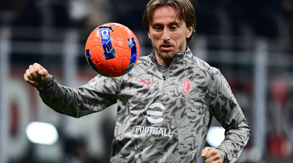 مودريتش أكد أن ميلان بمثابة حلم طفولته (أ.ف.ب) 