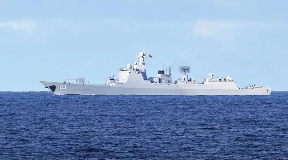 A Chinese PLA navy ship monitors an area during a maritime cooperative activity between the Philippines, Australia and Canadian navy near Scarborough Shoal in the disputed South China Sea on Sep 3, 2025. (AFP) 