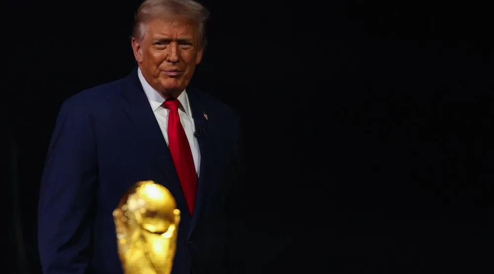 WASHINGTON, DC - DECEMBER 05: US President Donald Trump looks on during the FIFA World Cup 2026 Official Draw at John F. Kennedy Center for the Performing Arts on December 05, 2025 in Washington, DC. Patrick Smith/Getty Images/AFP