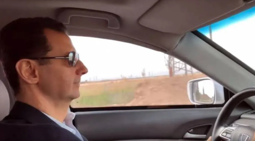 بشار الأسد يقود سيارته في الغوطة الشرقية في 2018 (أرشيفية - متداول)