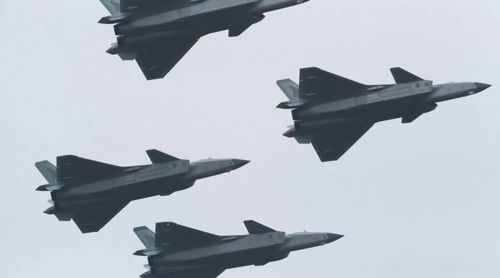 مقاتلات حربية صينية خلال عرض عسكري العام الماضي (أرشيفية - رويترز)