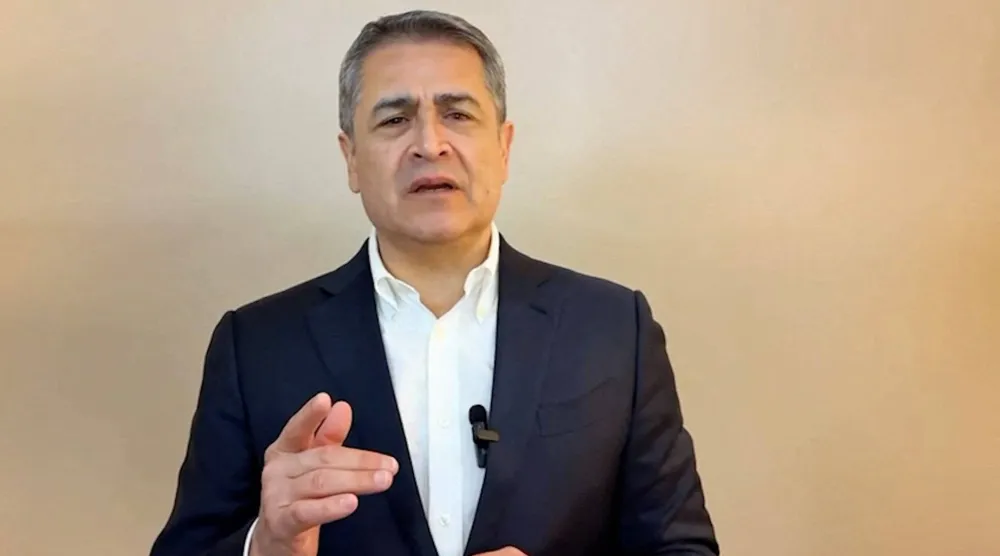 الرئيس السابق خوان أورلاندو هيرنانديز (رويترز)