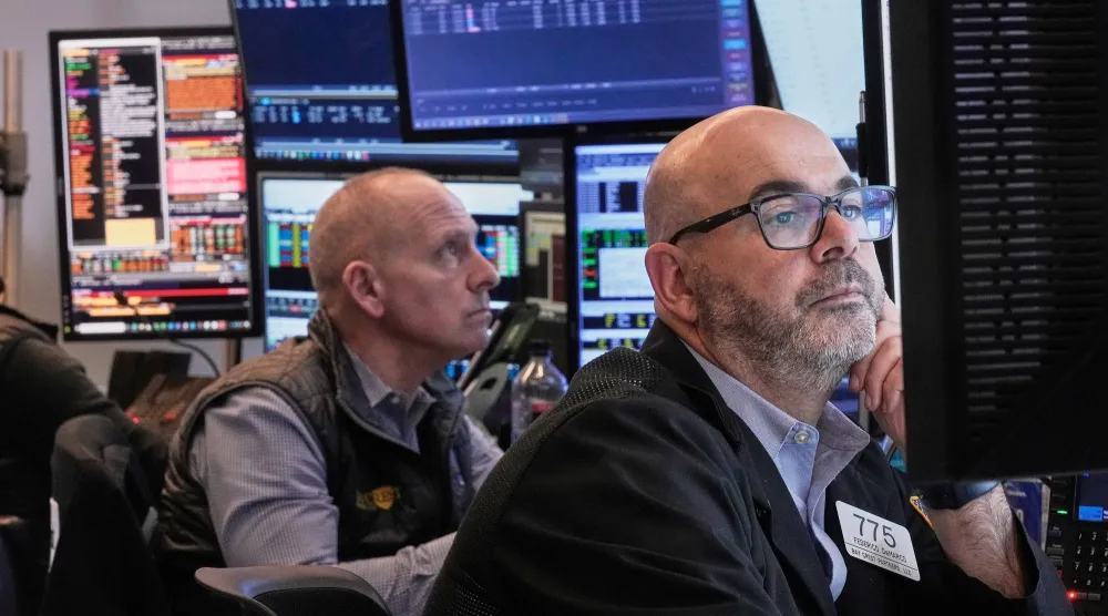 متداولون يعملون في بورصة نيويورك (أ.ب)