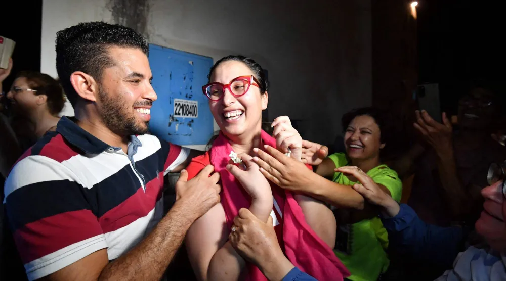 الناشطة السياسية شيماء عيسى (أ.ف.ب)