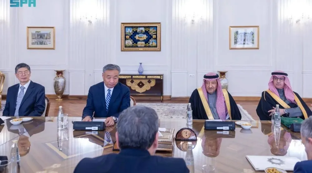 Iranian Minister of Foreign Affairs Abbas Araghchi receives the heads of the delegations of the joint trilateral committee in Tehran on Tuesday. (SPA)