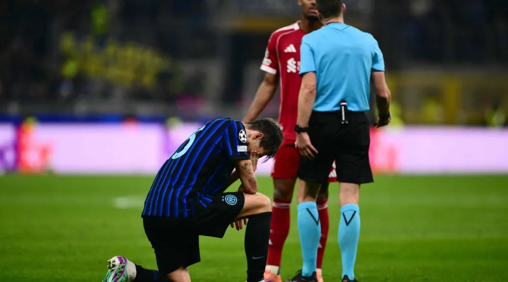 أتشيربي لحظة تعرضه للإصابة (أ.ف.ب)